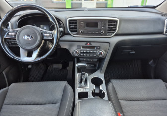 Подержанный автомобиль Kia Sportage 2018 года (9 фото)
