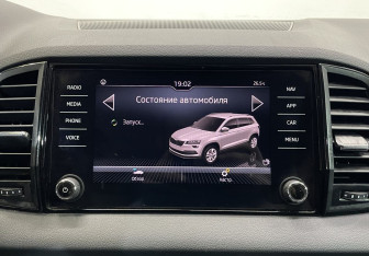 Подержанный автомобиль Skoda Karoq 2021 года (12 фото)