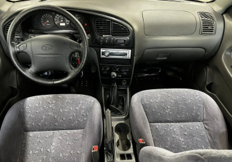 Подержанный автомобиль Kia Spectra Sedan 2007 года (10 фото)