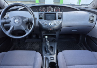 Подержанный автомобиль Nissan Primera Sedan 2003 года (9 фото)