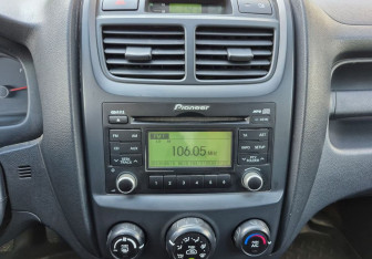 Подержанный автомобиль Kia Sportage 2010 года (13 фото)