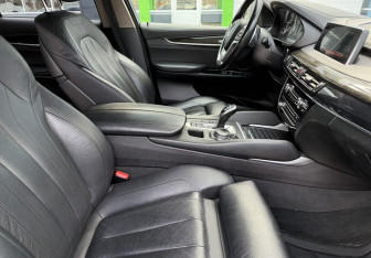 Подержанный автомобиль BMW X6 2016 года (10 фото)