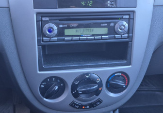 Подержанный автомобиль Chevrolet Lacetti Sedan 2011 года (13 фото)