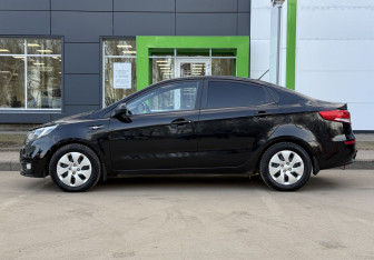 Подержанный автомобиль Kia Rio Sedan 2015 года (8 фото)