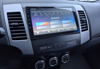 Подержанный автомобиль Mitsubishi Outlander 2011 года (14 фото)