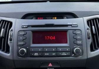 Подержанный автомобиль Kia Sportage 2012 года (13 фото)