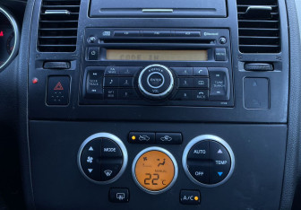 Подержанный автомобиль Nissan Tiida Hatchback 2008 года (16 фото)