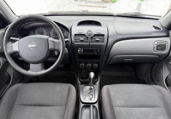Подержанный автомобиль Nissan Almera Classic 2009 года (9 фото)