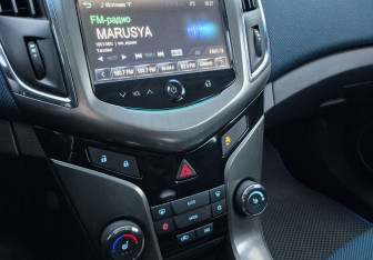 Подержанный автомобиль Chevrolet Cruze Wagon 2014 года (13 фото)