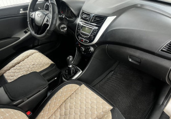 Подержанный автомобиль Hyundai Solaris Sedan 2011 года (12 фото)