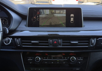 Подержанный автомобиль BMW X6 2016 года (14 фото)