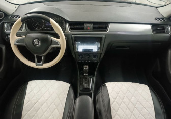 Подержанный автомобиль Skoda Rapid Liftback 2014 года (11 фото)