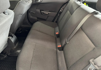 Подержанный автомобиль Opel Astra Hatchback 2010 года (12 фото)