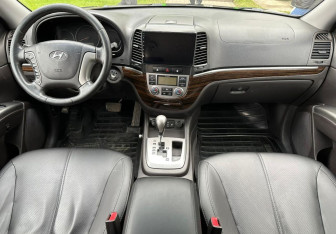 Подержанный автомобиль Hyundai Santa Fe 2012 года (11 фото)