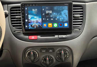 Подержанный автомобиль Kia Rio Sedan 2009 года (13 фото)