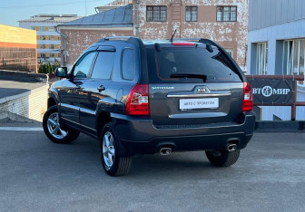 Подержанный автомобиль Kia Sportage 2009 года (7 фото)