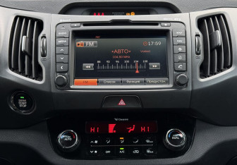 Подержанный автомобиль Kia Sportage 2013 года (14 фото)