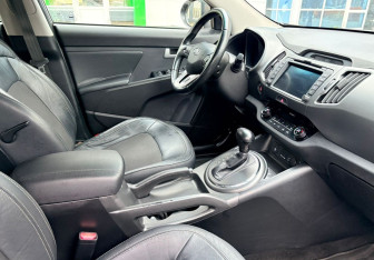 Подержанный автомобиль Kia Sportage 2013 года (9 фото)