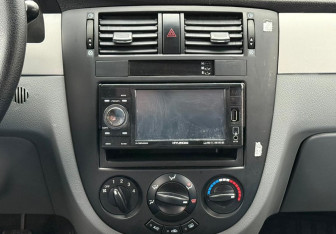 Подержанный автомобиль Chevrolet Lacetti Sedan 2011 года (13 фото)