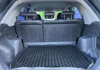 Подержанный автомобиль Kia Sportage 2009 года (19 фото)