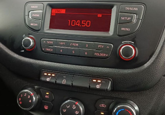 Подержанный автомобиль Kia Ceed Wagon 2015 года (14 фото)