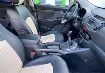 Подержанный автомобиль Kia Sportage 2010 года (10 фото)