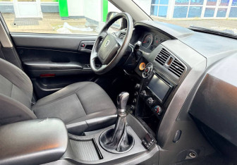 Подержанный автомобиль SsangYong Actyon Sports 2012 года (9 фото)