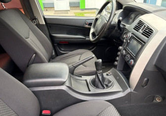 Подержанный автомобиль SsangYong Kyron 2012 года (10 фото)