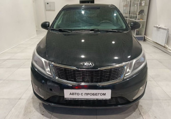 Подержанный автомобиль Kia Rio Sedan 2013 года (2 фото)