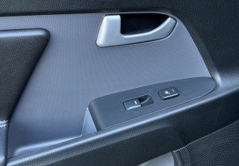 Подержанный автомобиль Kia Sportage 2011 года (17 фото)