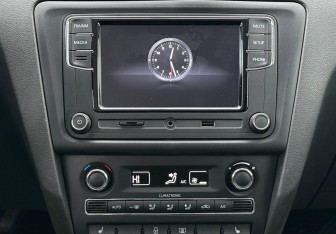 Подержанный автомобиль Skoda Rapid Liftback 2014 года (13 фото)