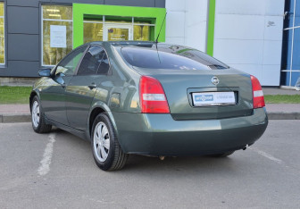 Подержанный автомобиль Nissan Primera Sedan 2003 года (7 фото)
