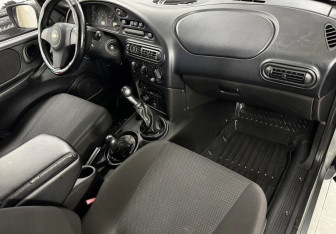 Подержанный автомобиль Chevrolet Niva 2011 года (11 фото)