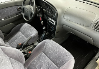 Подержанный автомобиль Kia Spectra Sedan 2007 года (11 фото)