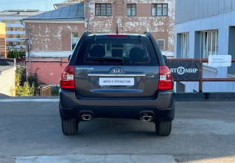 Подержанный автомобиль Kia Sportage 2009 года (6 фото)
