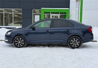 Подержанный автомобиль Skoda Rapid Liftback 2014 года (8 фото)