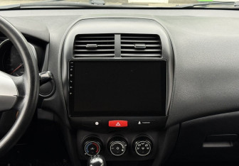 Подержанный автомобиль Mitsubishi ASX 2010 года (13 фото)