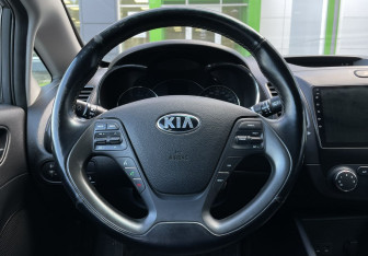 Подержанный автомобиль Kia Cerato Sedan 2014 года (14 фото)