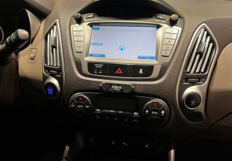 Подержанный автомобиль Hyundai ix35 2012 года (13 фото)