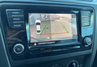 Подержанный автомобиль Skoda Rapid Liftback 2019 года (13 фото)