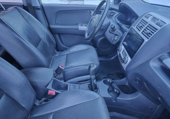 Подержанный автомобиль Kia Sportage 2007 года (10 фото)