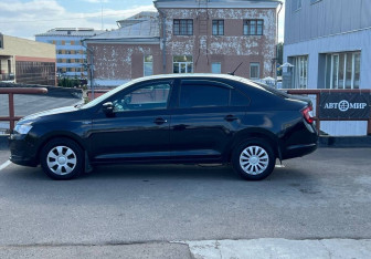 Подержанный автомобиль Skoda Rapid Liftback 2019 года (8 фото)