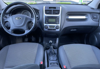 Подержанный автомобиль Kia Sportage 2009 года (11 фото)