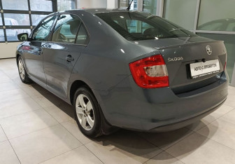 Подержанный автомобиль Skoda Rapid Liftback 2014 года (6 фото)