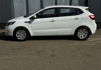 Подержанный автомобиль Kia Rio Hatchback 2013 года (5 фото)