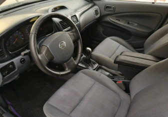 Подержанный автомобиль Nissan Almera Classic 2007 года (9 фото)