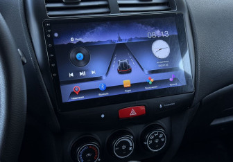 Подержанный автомобиль Mitsubishi ASX 2011 года (13 фото)