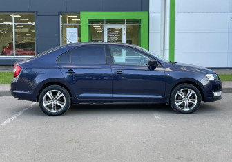 Подержанный автомобиль Skoda Rapid Liftback 2015 года (4 фото)
