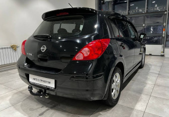 Подержанный автомобиль Nissan Tiida Hatchback 2013 года (5 фото)