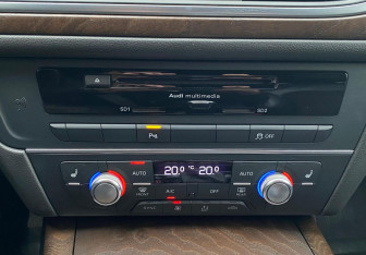 Подержанный автомобиль Audi A6 Sedan 2015 года (15 фото)